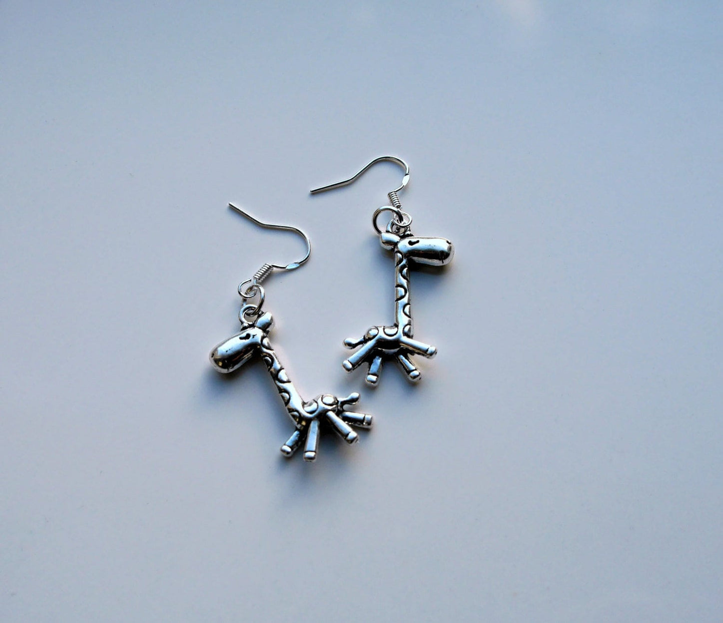 Giraffe Shaped Silver Toned Earrings (Ear Hook and Clip On)