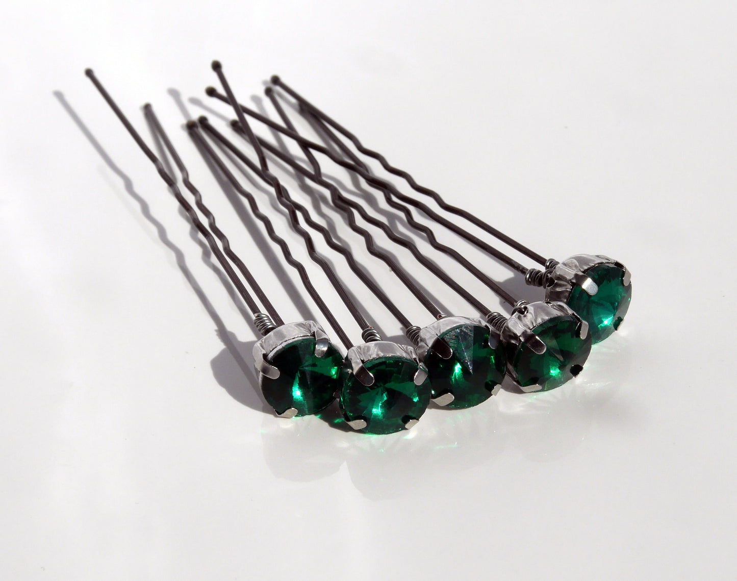 Green diamante rhinestone hair pins, perfect for dancers, bridesmaids, flower girls or even brides to add a touch of glam to hair.