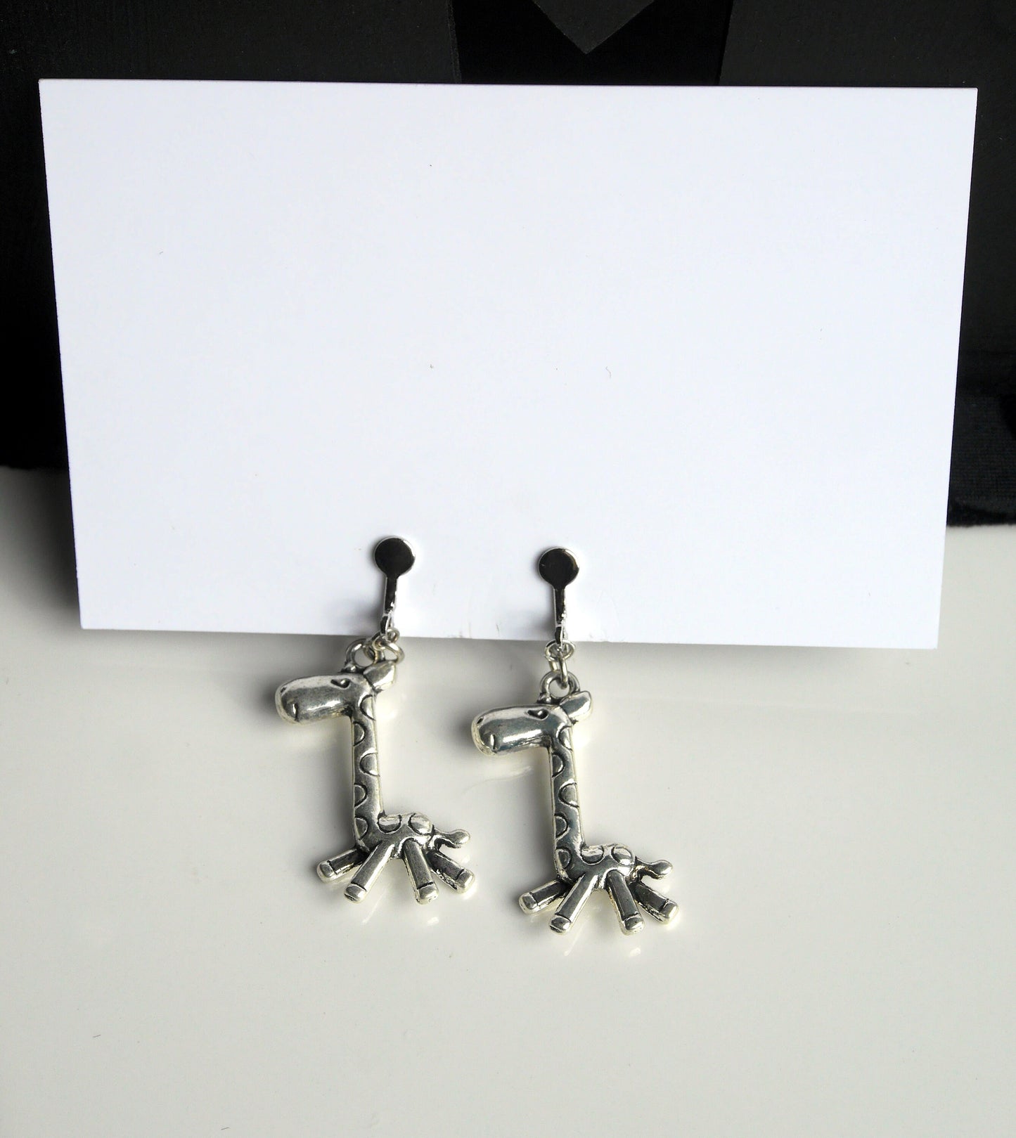 Giraffe Shaped Silver Toned Earrings (Ear Hook and Clip On)