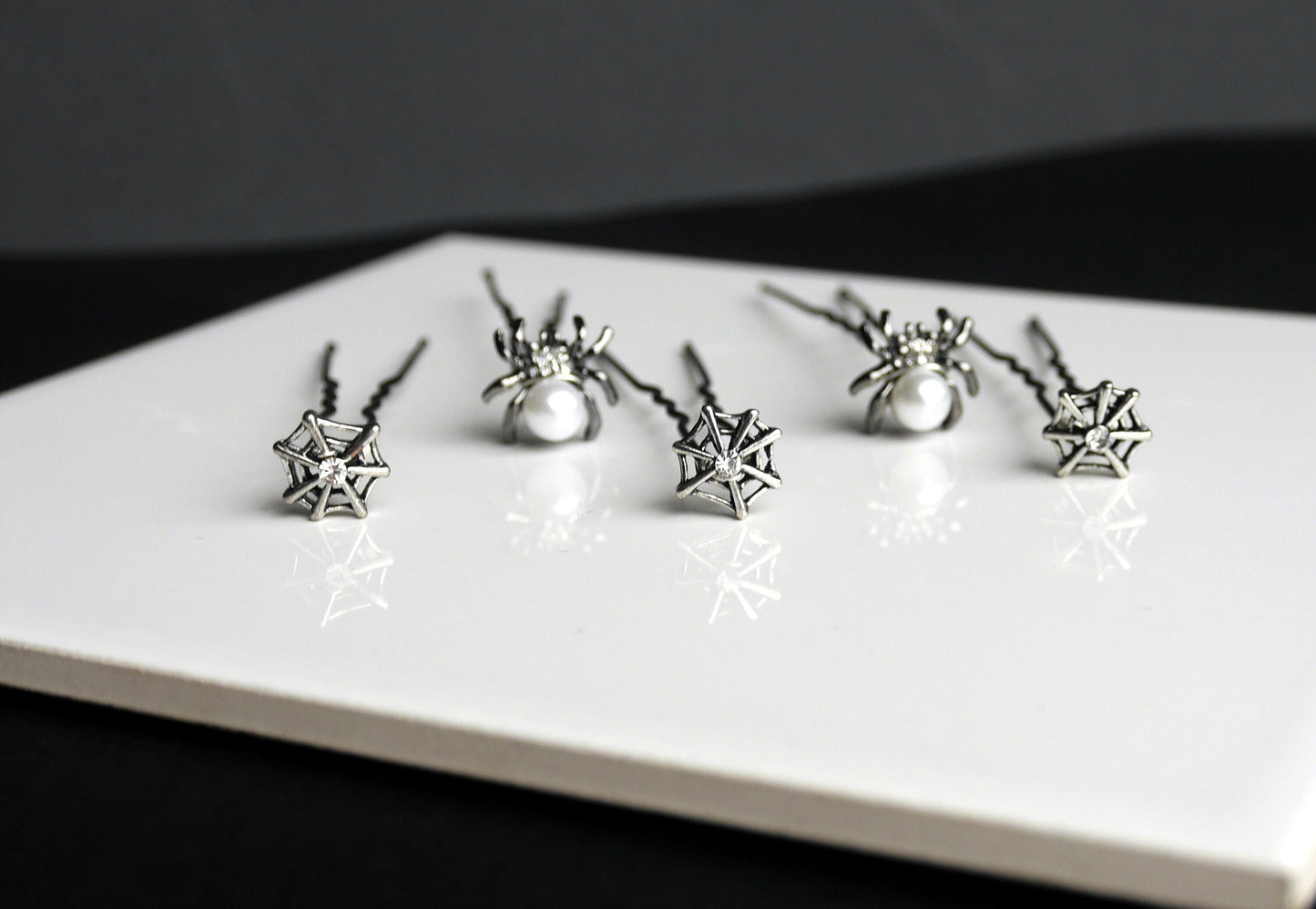 Beautiful Mini Silver Spider Hair Grips, Spider and Web Ballet Hair Pins, perfect for dancers, or even to add a touch of gothic glam to wedding or prom hair.