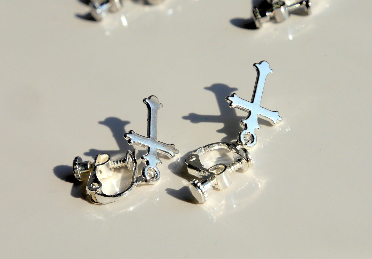 Small Silver Tone Cross Shaped Clip On Earrings