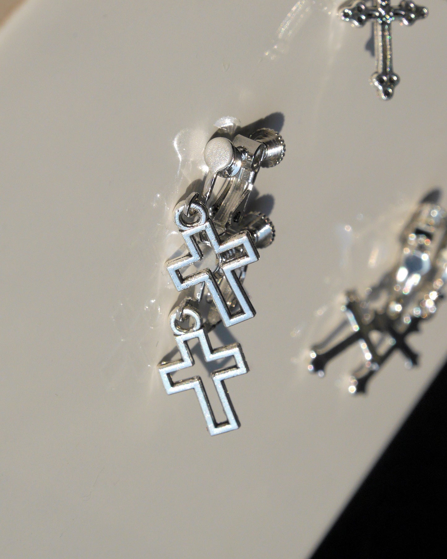 Small Silver Tone Cross Shaped Clip On Earrings