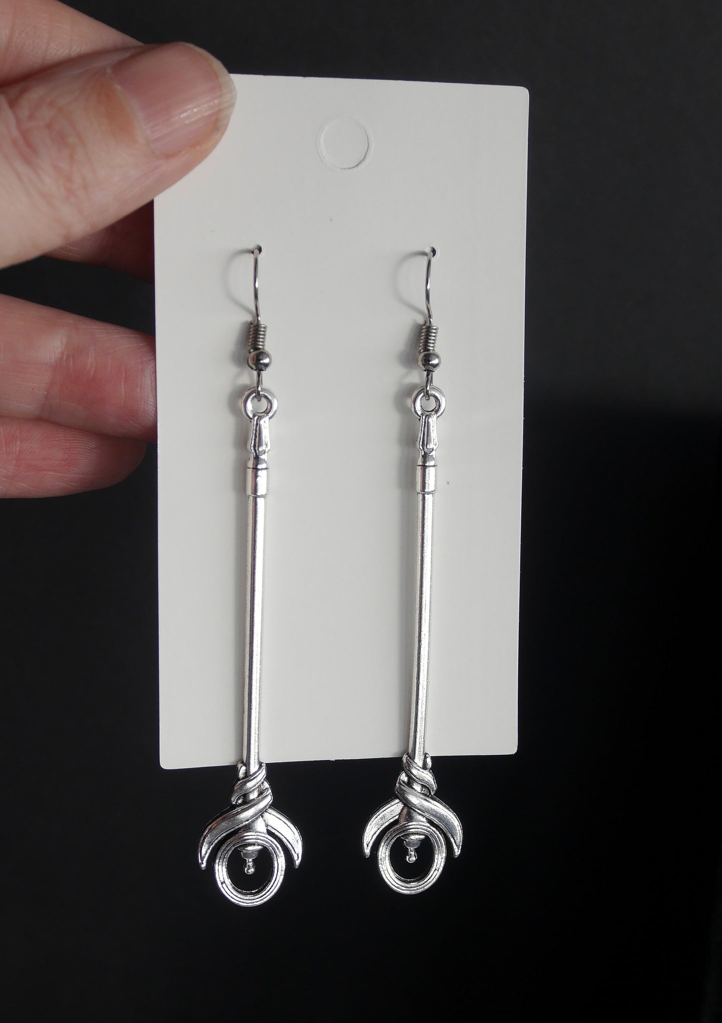 Silver Toned Two Handed Staff Style Weapon Earrings (Ear Hook, Stud and Clip On)